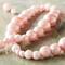 12 Pack: Pink Marble Glass Round Beads by Bead Landing™